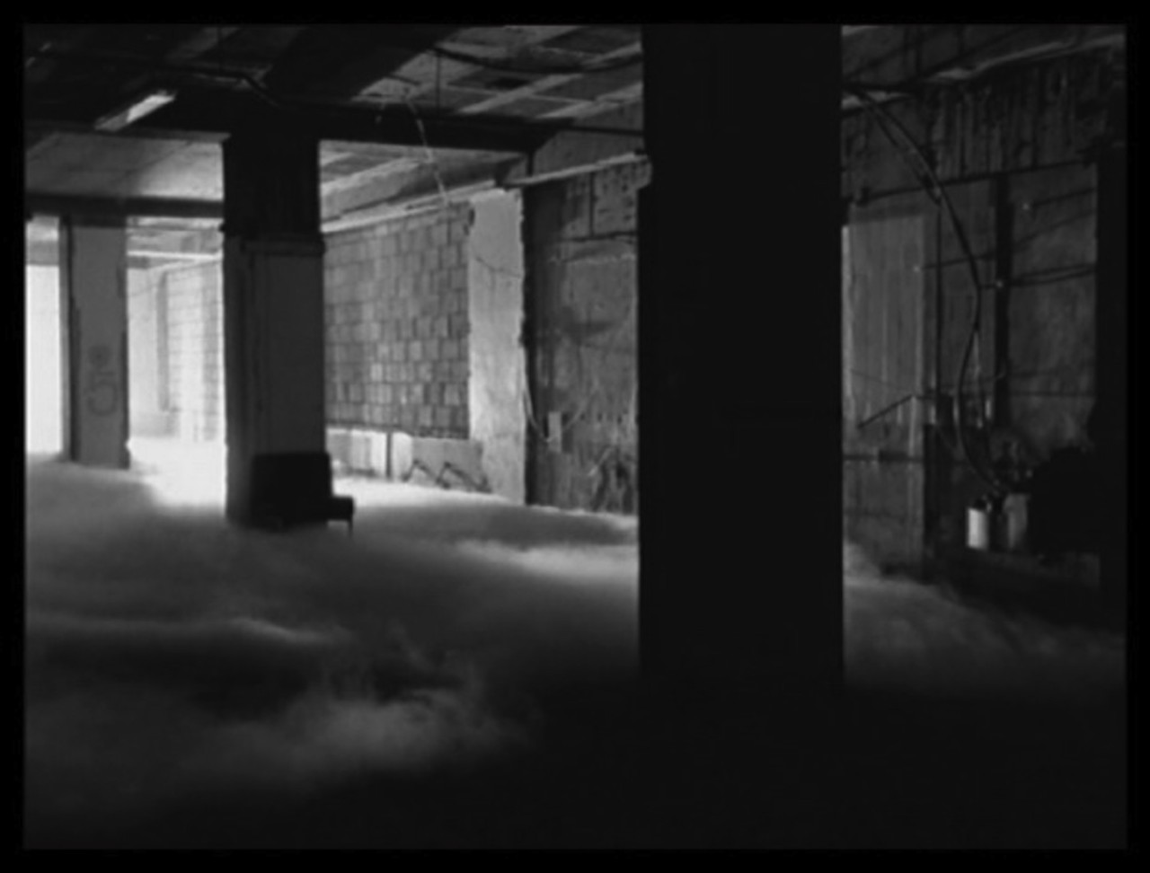 Still from Graham Gussin, 'Spill', 1999. 12 min loop. 16mm B/W. Silent. Courtesy of the artist