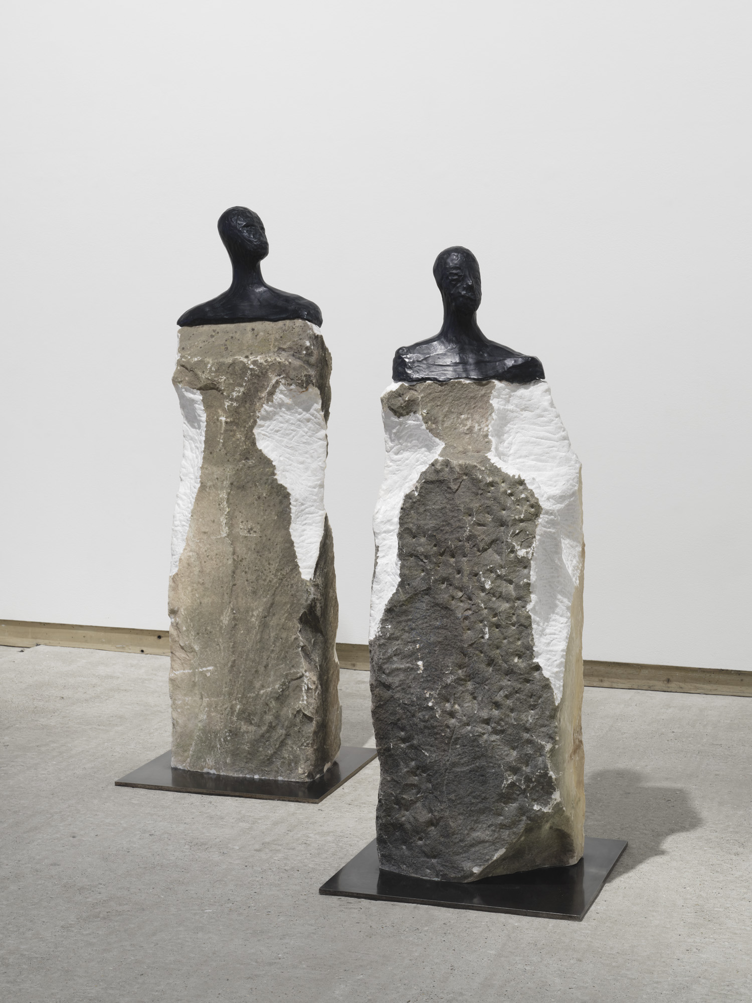 Two sculptural busts on stone plinths