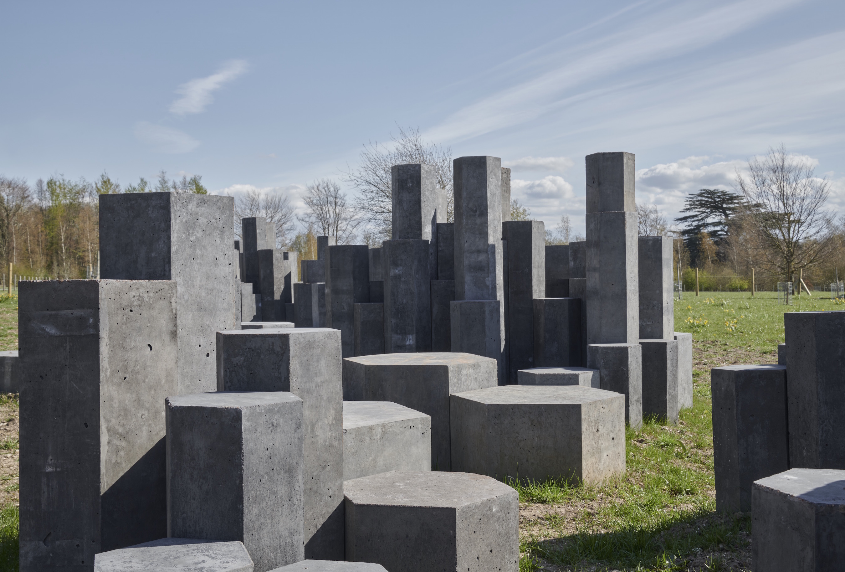 A public art sculpture by artist Tania Kovats which consists of modular hexagonal concrete forms situated outside and surrounded by trees in the background