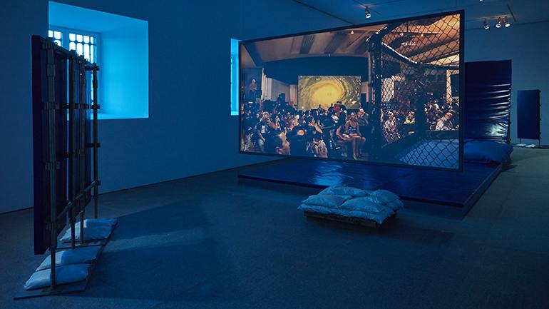 Hito Steyerl, Duty-Free Art, installation view, Museo Nacional, Centro de Arte Reina Sofia, Madrid, 2015. Courtesy the artist and Andrew Kreps Gallery, New York. Image courtesy Museo Nacional, Centro de Arte Reina Sofia, Madrid.