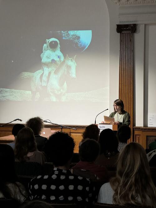 A person speaking on stage